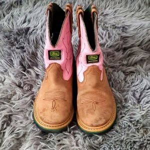 Cowgirl John Deere boots.